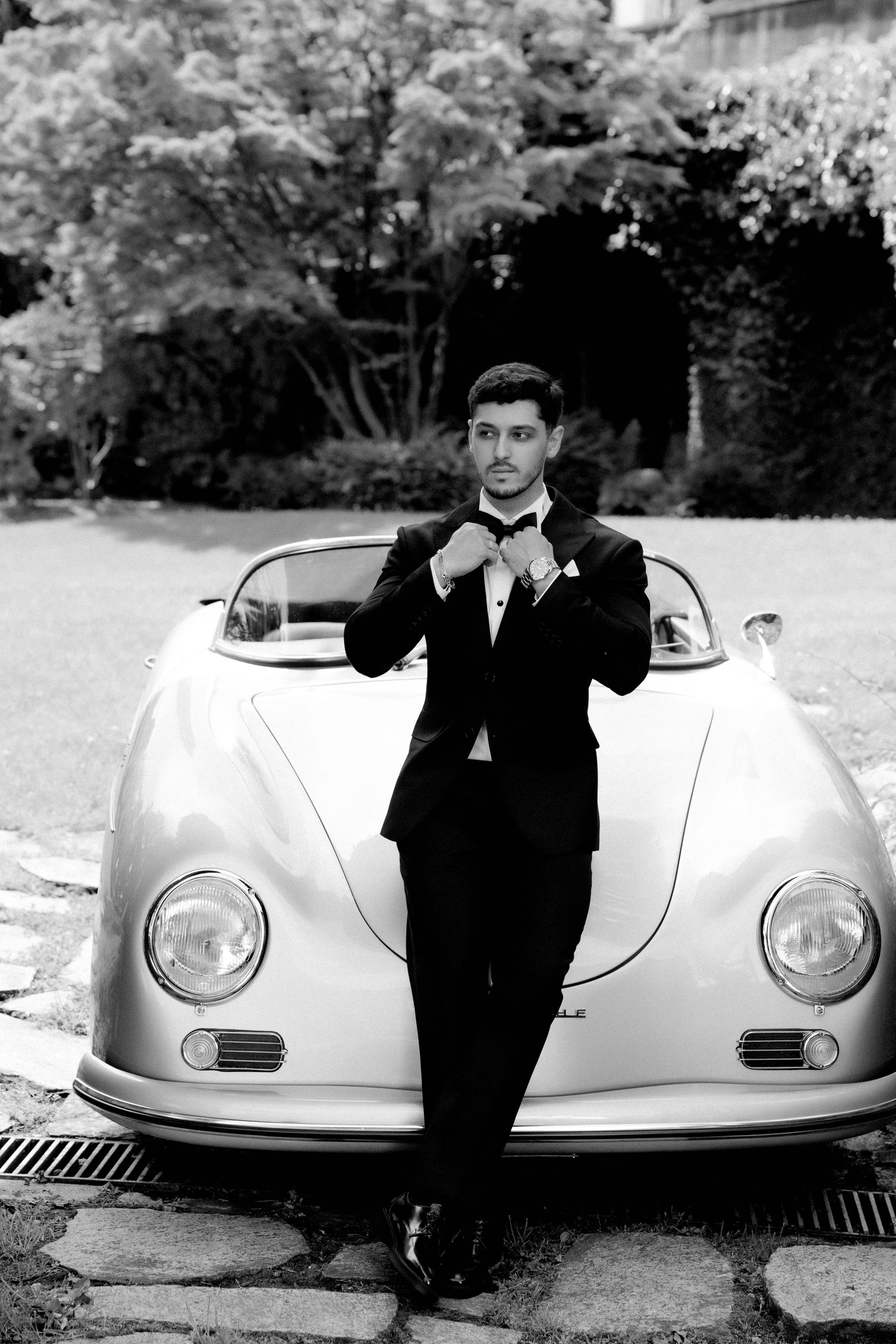 photo of the groom near the car