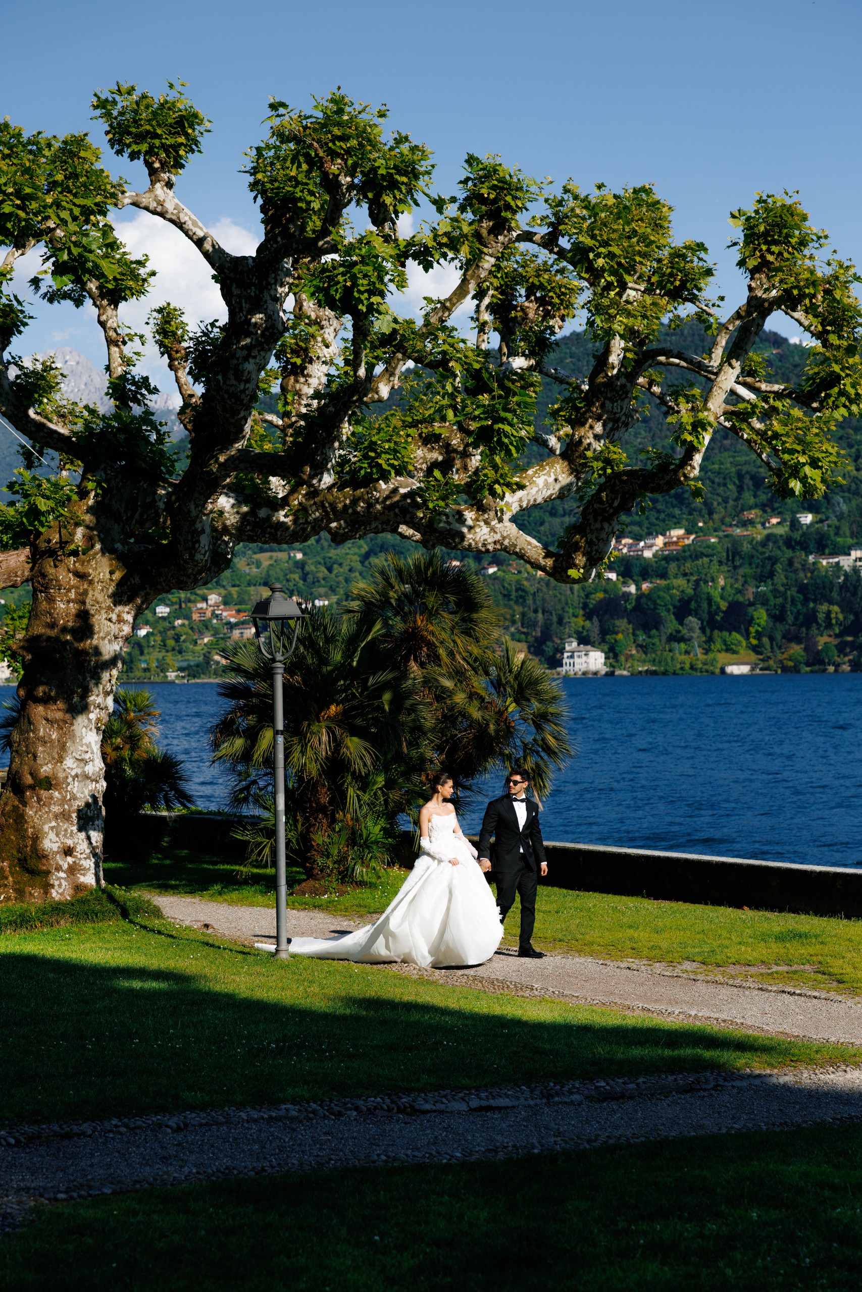 wedding photo shoot of a couple with a beautiful view of the lake